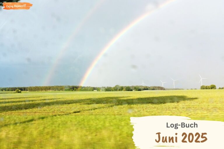 Regenbogen über grünem Feld