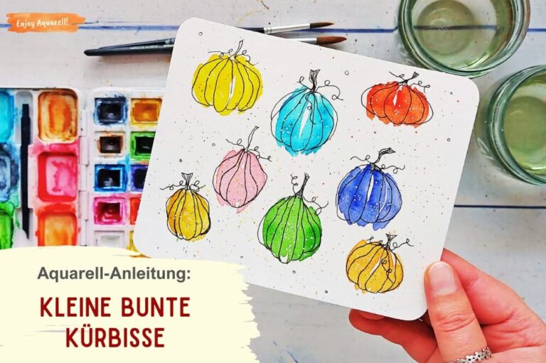 Hand hält Bild mit kleinen bunten Kürbissen gemalt mit Aquarellfarben und Fineliner