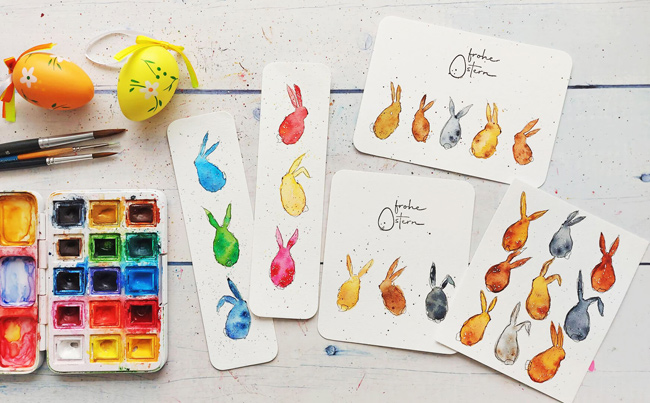 Mehrere Bilder mit bunten kleinen Aquarell-Hasen auf Malplatz