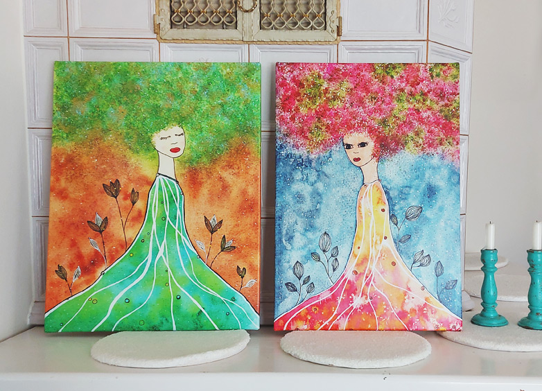 2 Aquarell-Leinwanddrucke mit Frauen in leuchtend bunten Farben