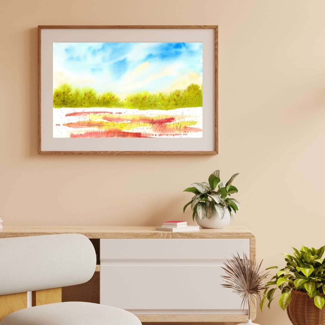 Aquarellbild mit halbabstrakter Waldlandschaft mit stürmischem türkis-grauen Himmel an sandfarbener Wand über Sideboard