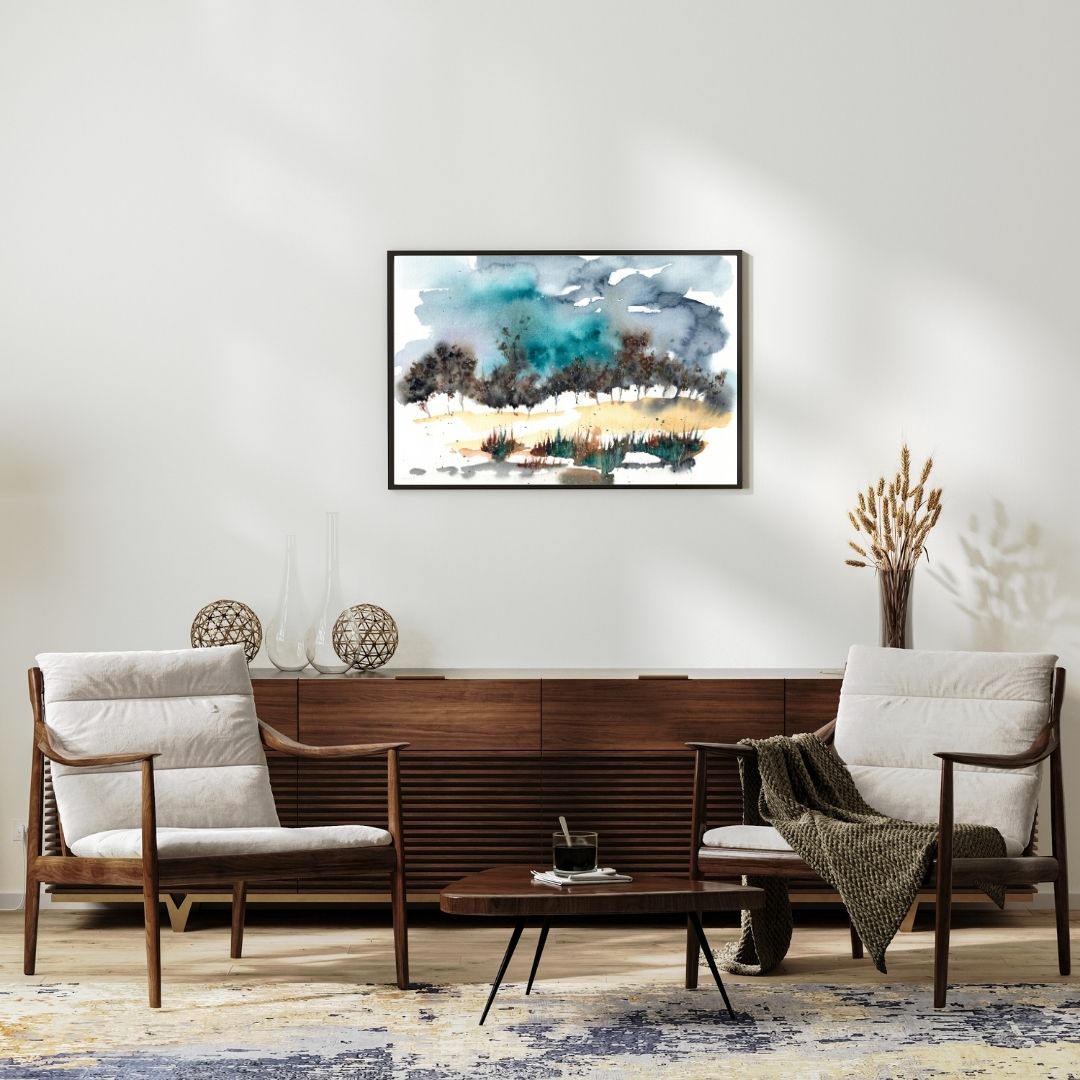 Aquarellbild mit halbabstrakter Waldlandschaft mit stürmischem türkis-grauen Himmel an grauer Wand mit zwei Sesseln
